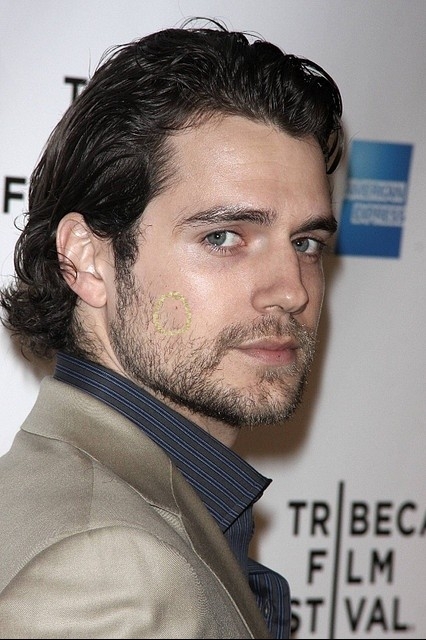Where is the freckle on Henry Cavills face?