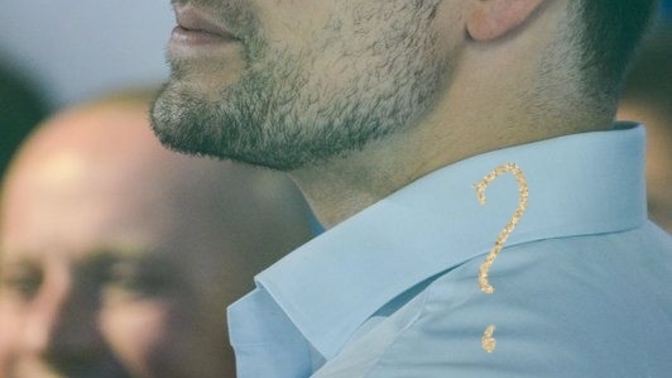 Where is the freckle on Henry Cavill's face?