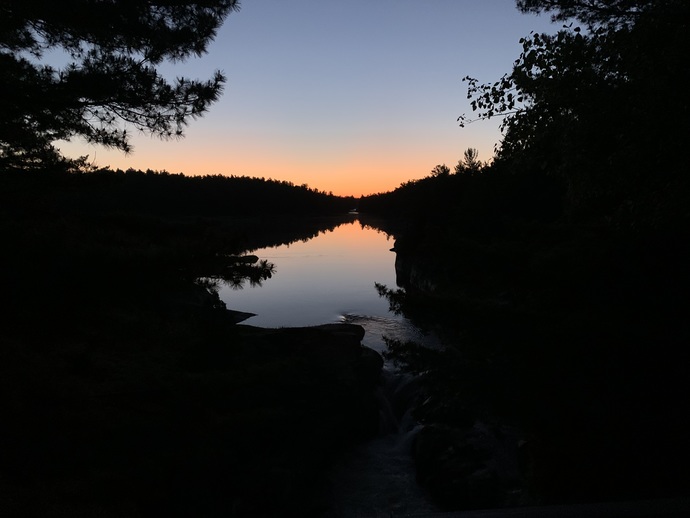 Walking alongside the river at the one end of my property.