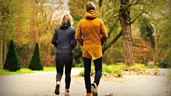 Does asking someone to go for a walk have a romantic undertone?