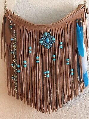 Girls, Describe and /Or Name Your Favorite Purse You Own at this time?