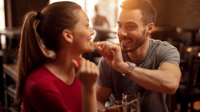 Why does my male friend who knew I liked him still flirt with me when he has a girlfriend?
