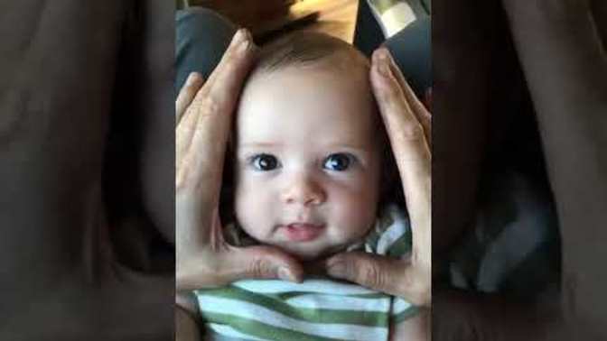 Have people always squeeze a baby's face or is this a new trend?