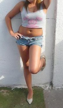 How about that crop top and shorts on her?
