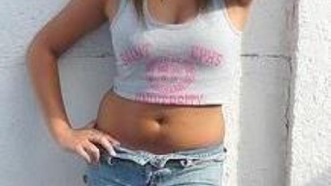 How about that crop top and shorts on her?