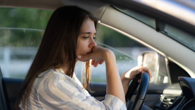 Annoying colleague keeps asking for lifts or waiting outside my door for a lift to work - how can I stop this without being rude?