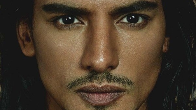 Do you believe that dark features make someone look more masculine?