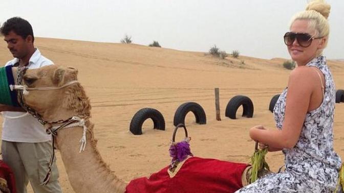 Do you assume a woman has been defecated on if she went to Dubai?