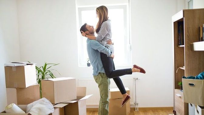What are some signs that you're ready to take your relationship to the next level, such as moving in together or getting married?
