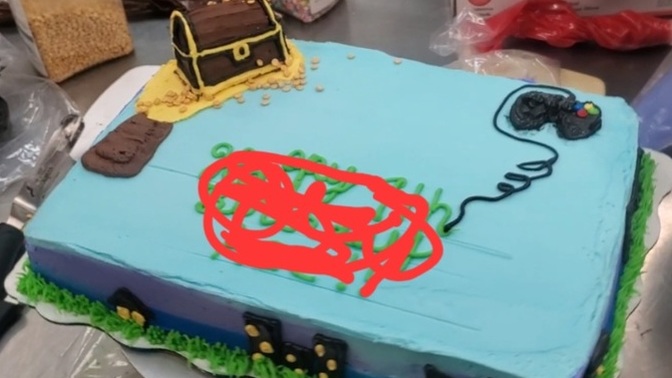 Not my best work but do we think the treasure chest is made out of frosting entirely the blank spot because the had a character silhouette they had?