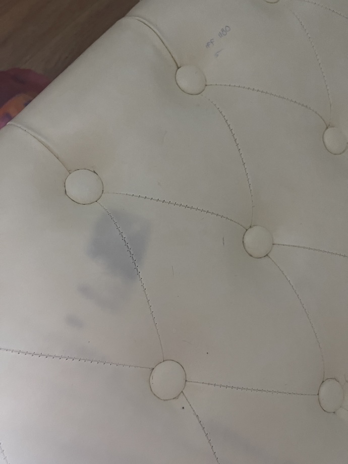 Does anyone know how to get rid of this stain on my sofa? GirlsAskGuys