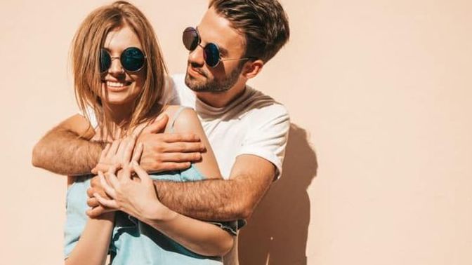 What does it mean when a woman rubs your arm up and down as you hug her from behind?