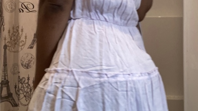Which dress (outfit) is more attractive?