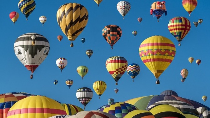 What makes a hot air balloon go up?