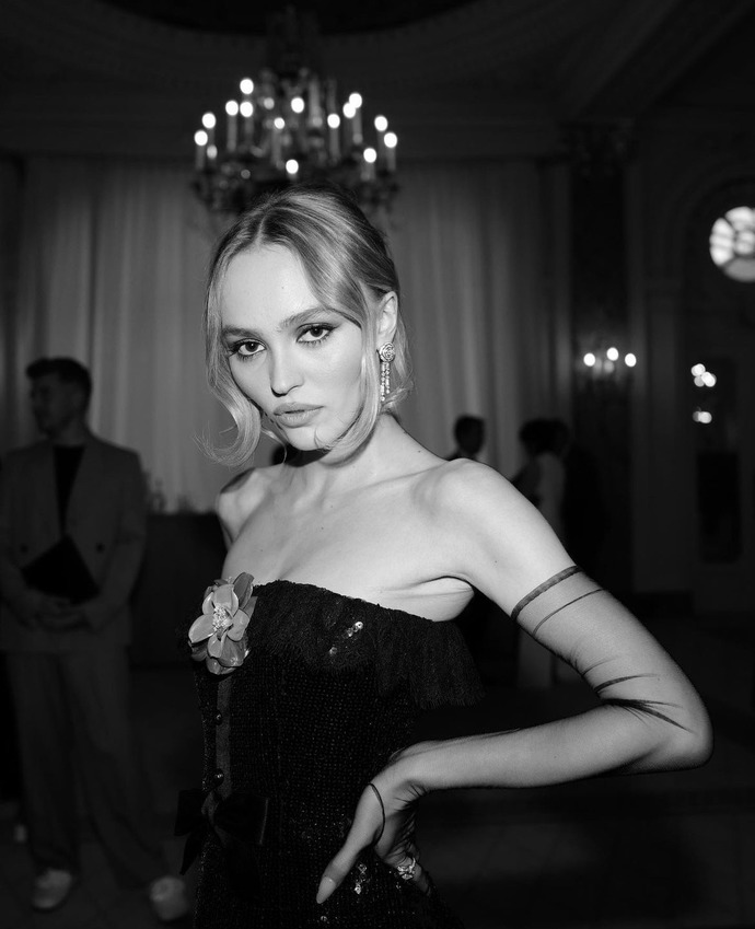 What do you think of Lily Rose Depp at the Cannes Film Festival for the premiere of The Idol wearing Chanel fashion week 1994?