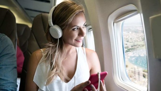 How do you pass the time when travelling by air?