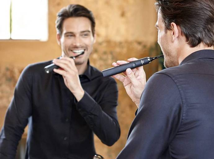 Do you ever walk around and do other things while brushing your teeth?