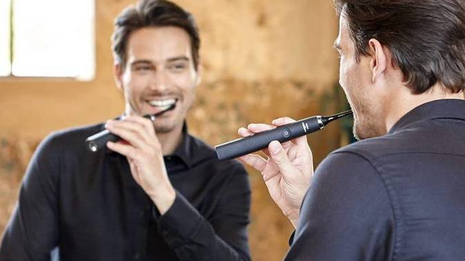 Do you ever walk around and do other things while brushing your teeth?