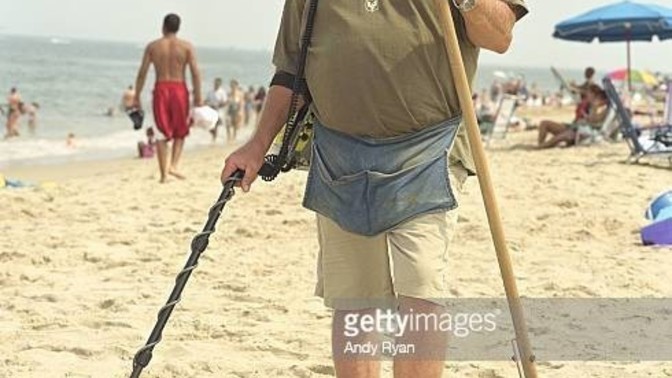 Why are there so many people with metal detectors at crowded beaches?