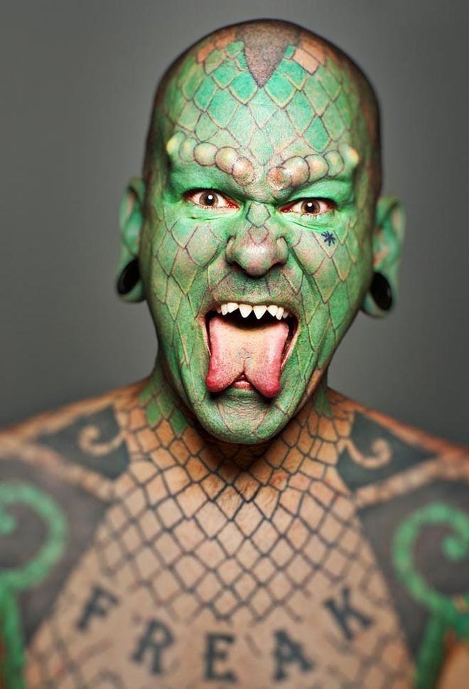 Do you know anyone that would wear a lizard for an earring?