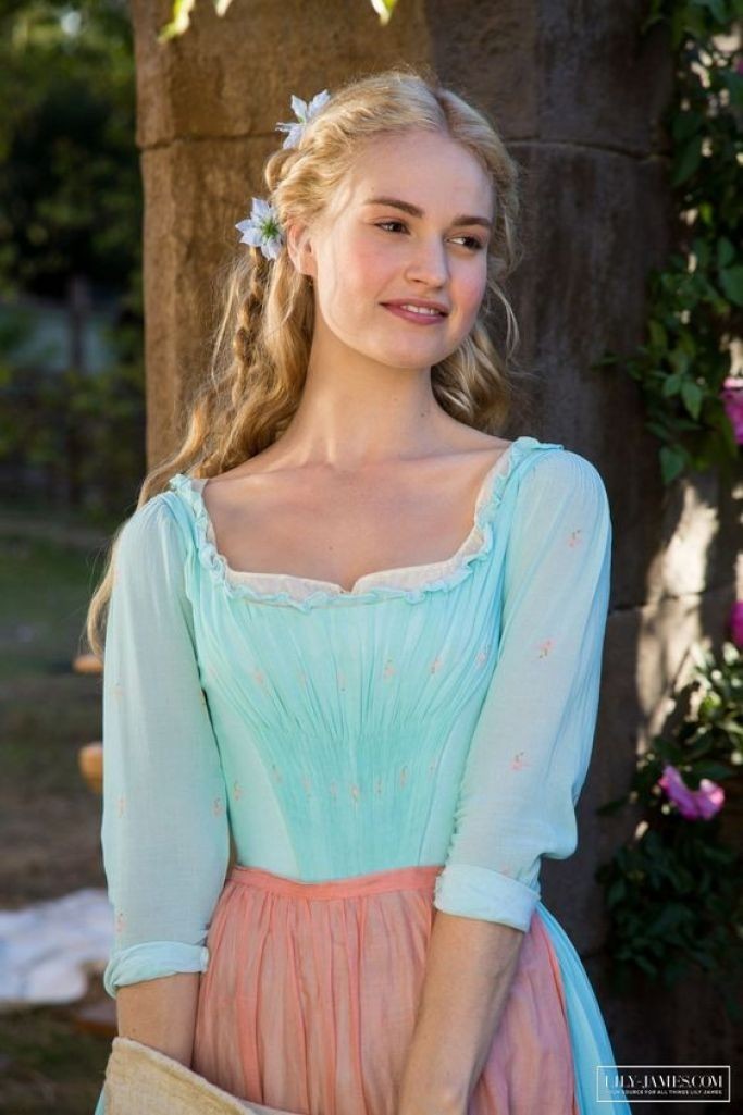 English actress Lily James, who played the Walt Disney character Cinderella. Did both the evening gown and housekeeping attire make her look pretty?