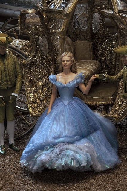 English actress Lily James, who played the Walt Disney character Cinderella. Did both the evening gown and housekeeping attire make her look pretty?
