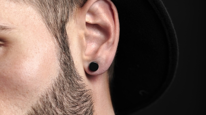 Opinions on black button ear studs on guys?