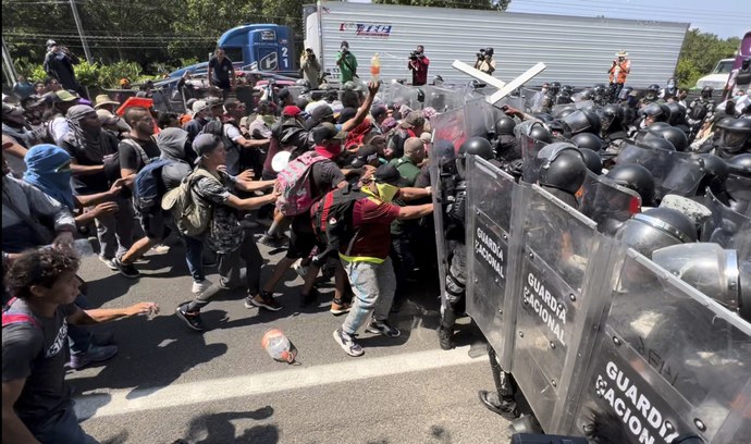 Surge of migrants rush border after Biden lifts COVID-19 border restrictions -