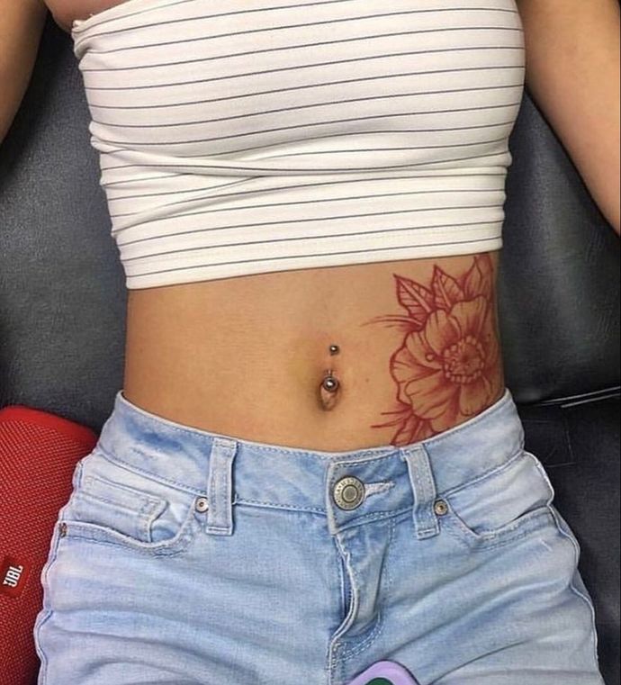 Are stomach tattoos on the ladies giving such an attraction?