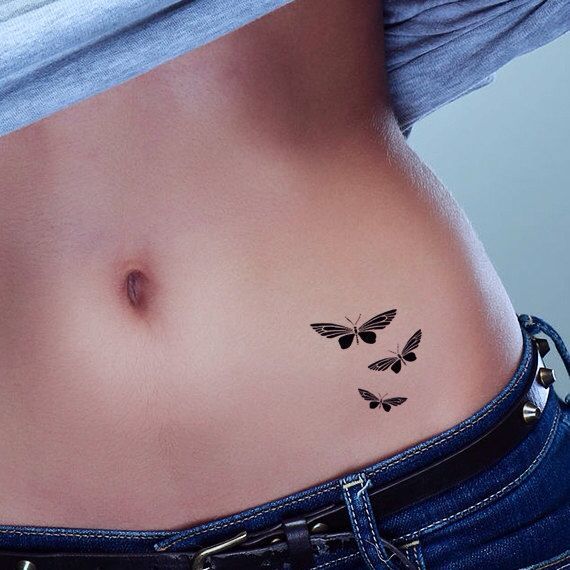 Are stomach tattoos on the ladies giving such an attraction?