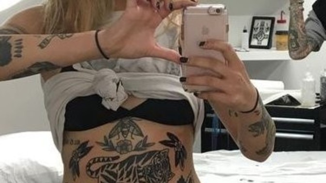Are stomach tattoos on the ladies giving such an attraction?