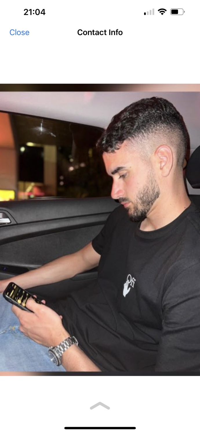Is this man wearing a Rolex?
