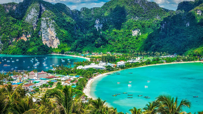 If money wasn't a problem, where would you go for vacation for let's say 2 weeks?