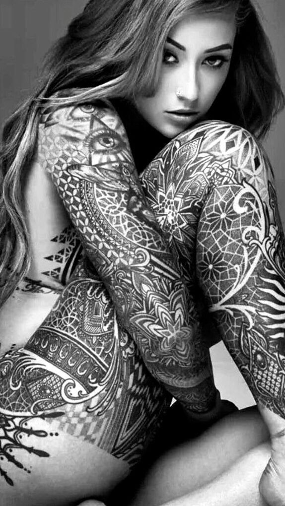 I think tattoos done tastefully are uber, uber sexy, beautiful, and artful. What do you think?
