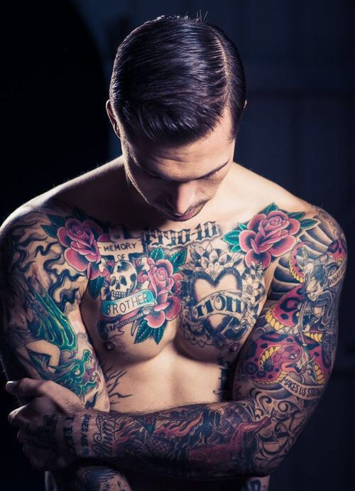 I think tattoos done tastefully are uber, uber sexy, beautiful, and artful. What do you think?