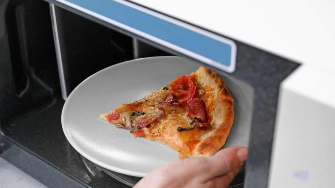 Do you prefer to eat leftover pizza cold or warmed up?
