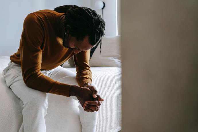 Conflict in long-distance relationship: Moms visit exposes her racist views. Boyfriends angry reaction and claim of no feelings. Seeking advice?