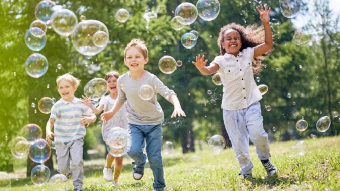 When you were a kid, did you use to go outside and play with other kids or did you play indoors with your own toys?