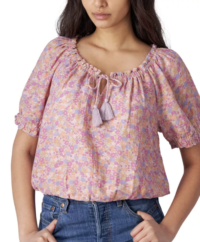 Which floral blouse would harmonize best for tan skin, brown hair and green eyes?