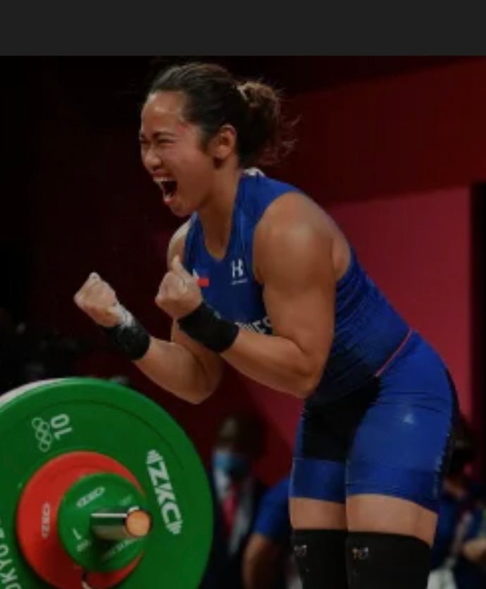 Guys, what would be your first reaction to a female weightlifter with muscles?