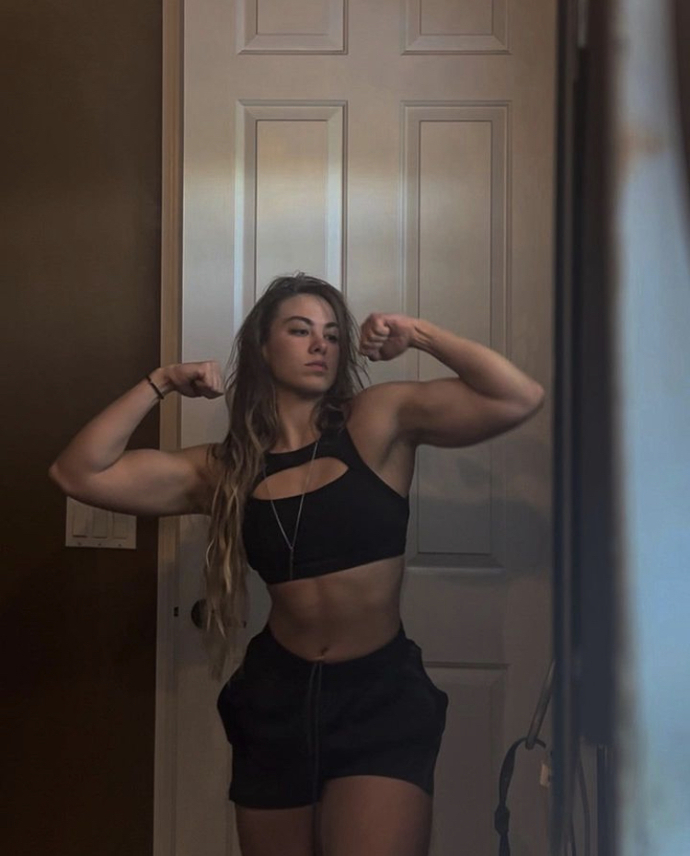 Guys, what would be your first reaction to a female weightlifter with muscles?