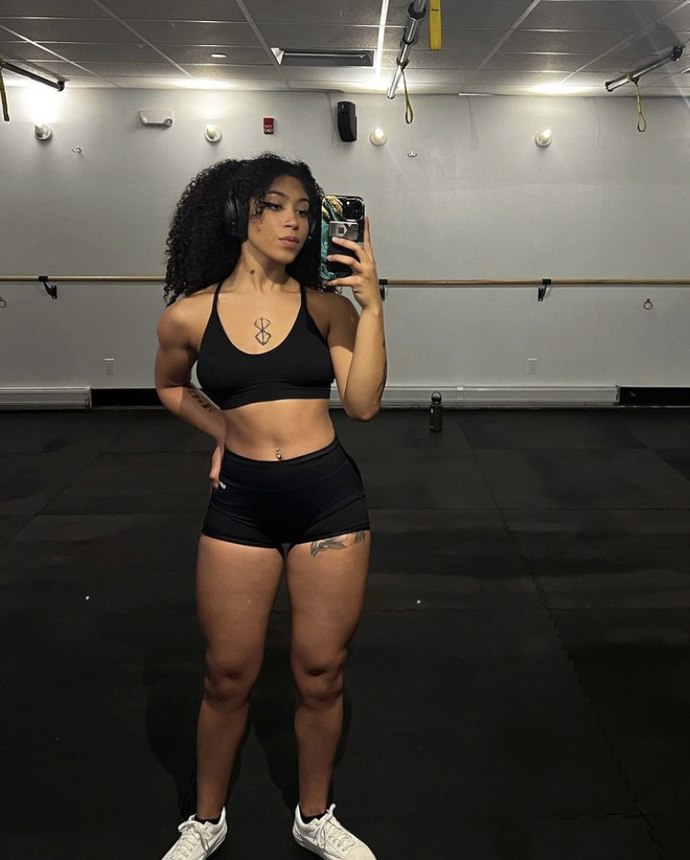 Guys, what would be your first reaction to a female weightlifter with muscles?