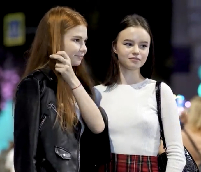 Which of these sisters has a better outfit?