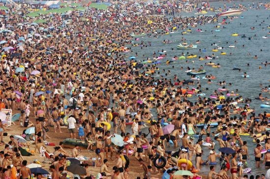 What is the attraction of a crowded beach?