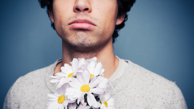 Why do men find it difficult to do the little things like give flowers or compliments?