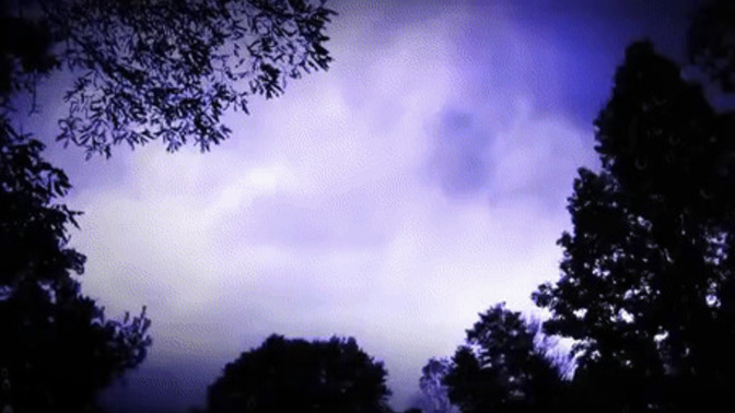 How can you determine the distance of an oncoming storm?