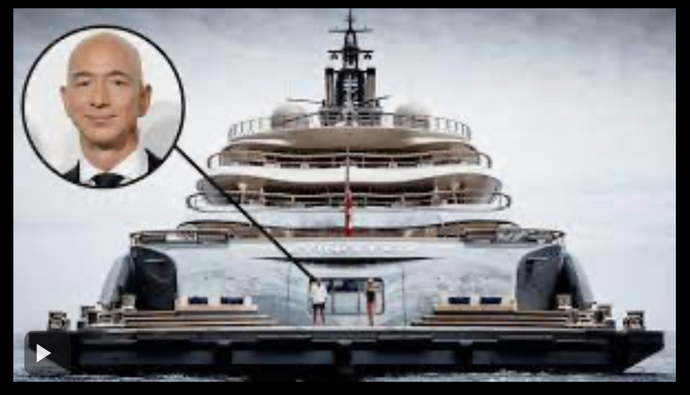His super yacht that needs its own yacht.