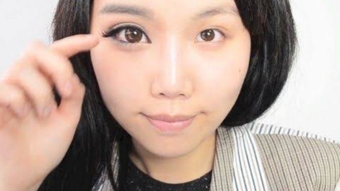 Is wearing coloured enlarging contacts catfishing?