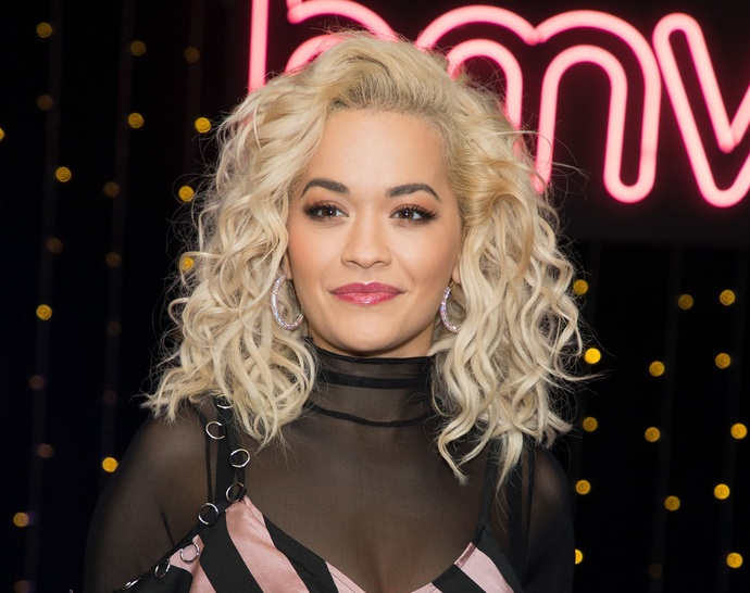 Is it just me or Rita Ora looks half black?