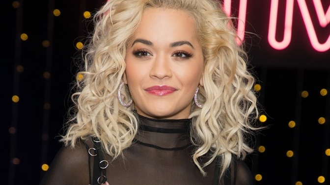 Is it just me or Rita Ora looks half black?